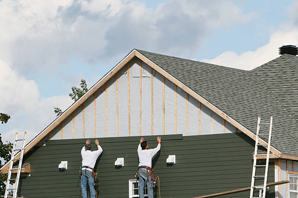 Professional Siding Contractor technician working in Clinton, MD